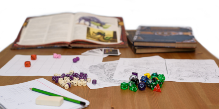 books, character sheets, and dice