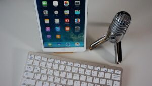 Podcast microphone, keyboard and iPad